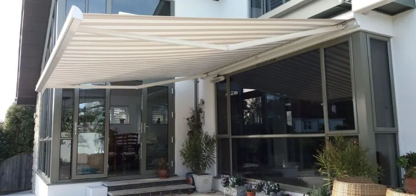 stripped awning attached to a house