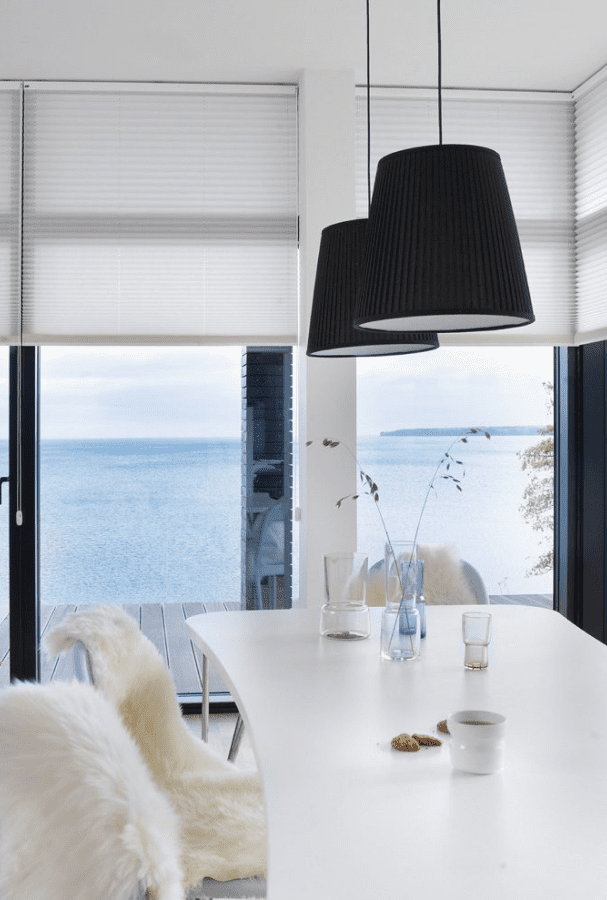 White blinds in a seaside apartment