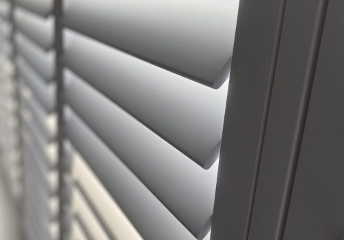 close up of white window shutters