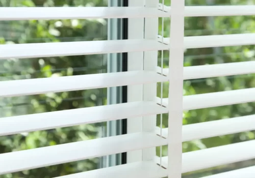White Venetian Blinds in a Garden Room