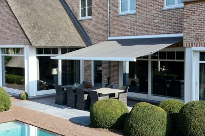B24 Elite Awning shading a garden patio