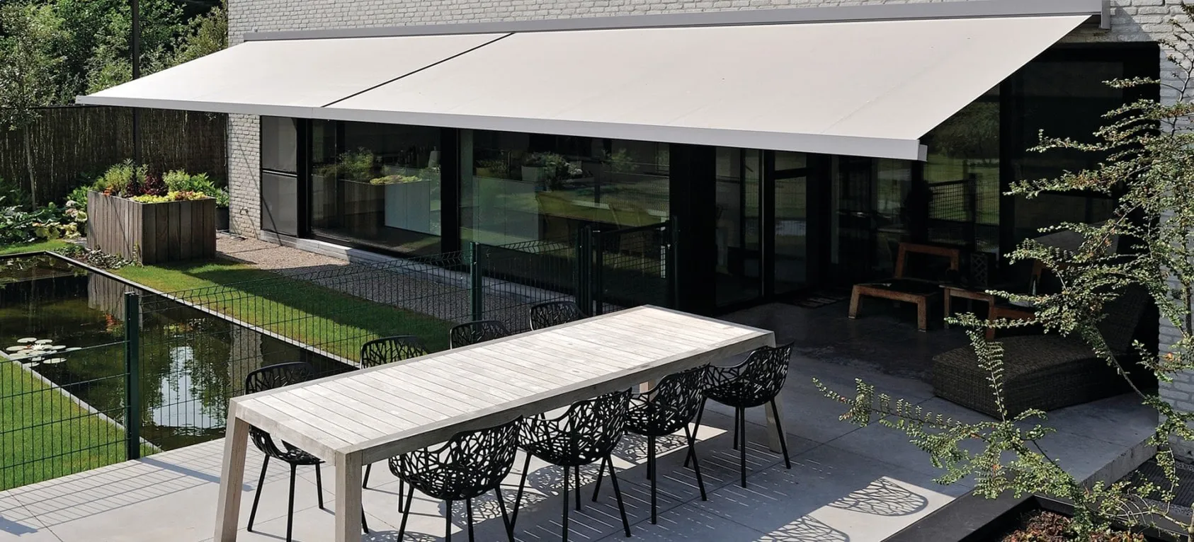 Garden Awnings providing shade to a patio area