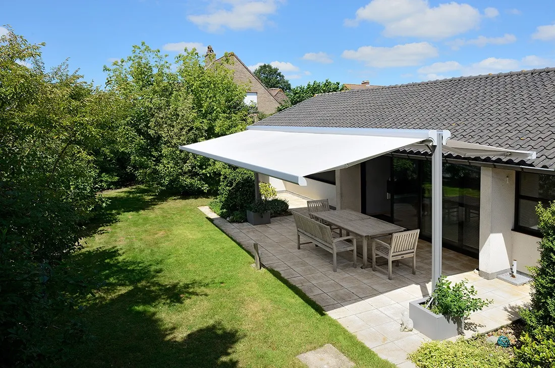 White Twinstor Awning Shading a Patio
