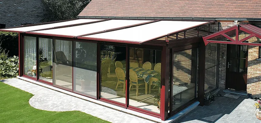 Large awnings over a conservatory