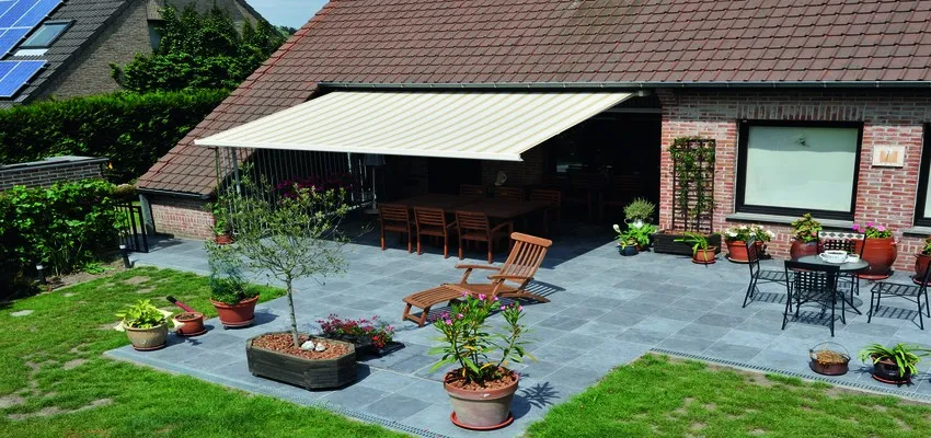 A large patio awning shading a garden