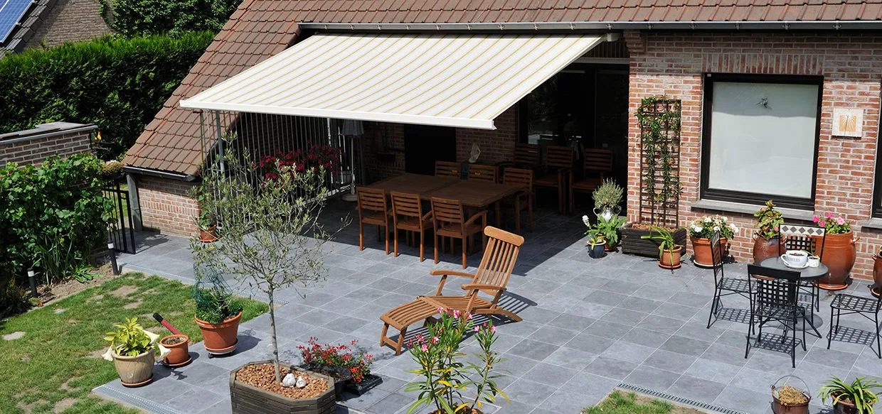 Stripped awning over a garden patio